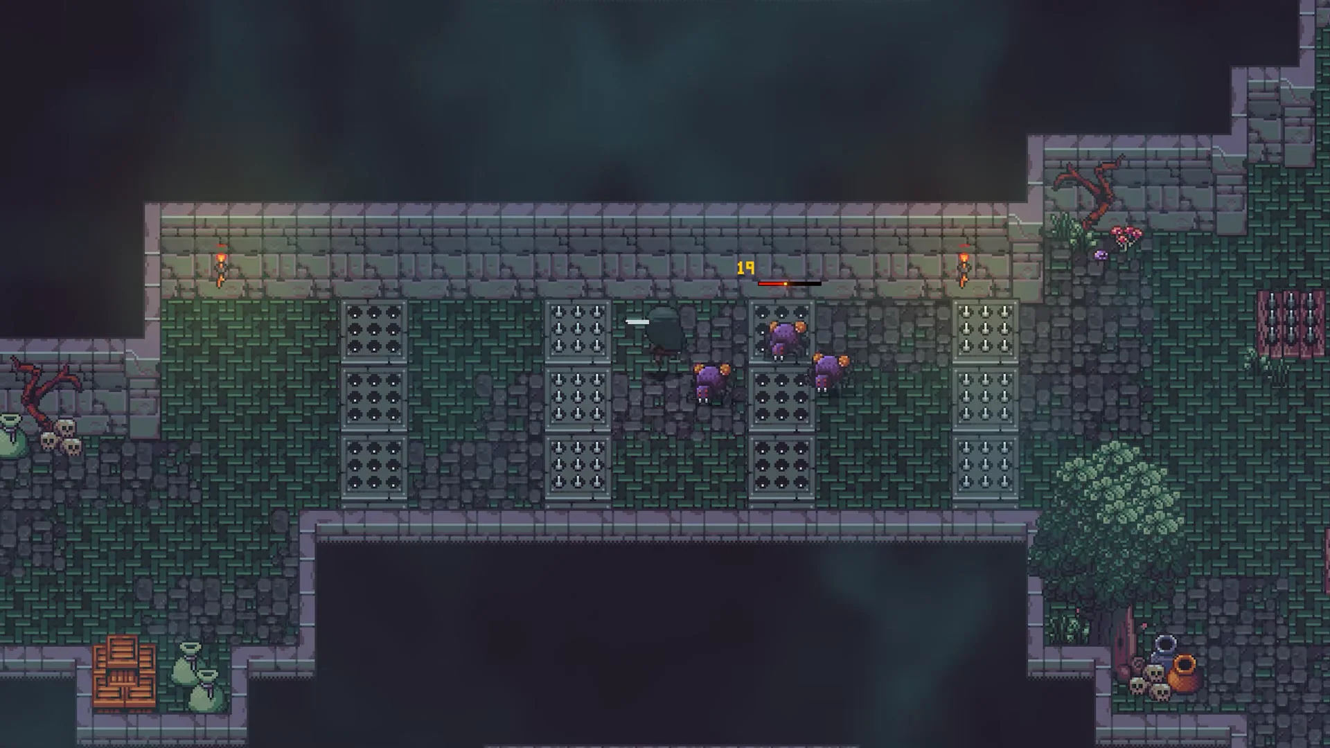 Player striking purple spider enemies with sword attacks over spike floor traps