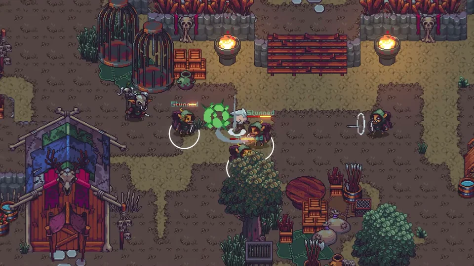 Player fighting goblin enemies with sword strikes near cages and torches